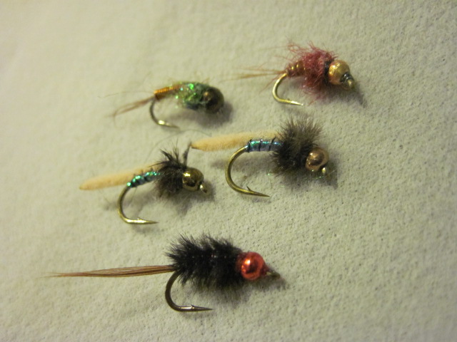 SINK RATES OF FLIES TIED WITH TUNGSTEN AND BRASS BEADS